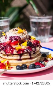 Brunch Meal: American Blueberry Pancakes With Lemon Curd And Berries