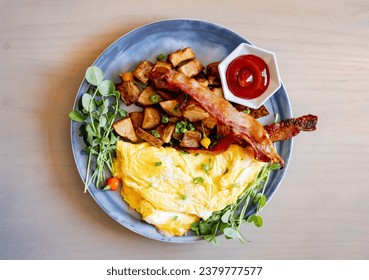Brunch Omelette with Bacon and Ketchup at Upscale restaurant
