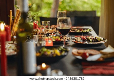 Brunch table setting with different delicious food and beverages ready for friends home party