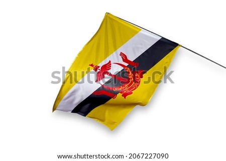 Brunei flag isolated on white background. close up waving flag of Brunei. flag symbols of Bruneian.