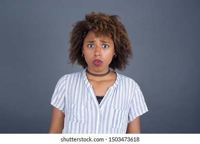 Brunette African American woman in casual clothes expressing disgust, unwillingness, dislike, disregard having tensive look frowning face. - Shutterstock ID 1503473618