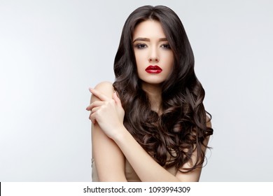Brunette asian girl with long curly hair