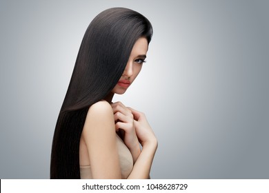 Brunette asian girl with long straight hair
