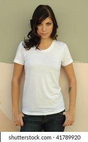 Brunette Female Fashion Model In Casual Clothes