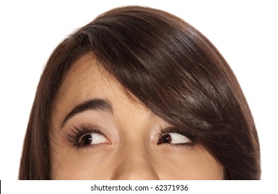 Brunette Girl Looking To Her Right, Showing Only Her Eyes.