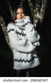 Brunette Girl Wearing Fuzzy Mohair Wool Grey Sweater In Woods