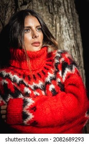 Brunette Girl Wearing Fuzzy Mohair Wool Red Sweater In Woods