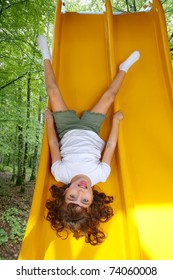 10,778 Child sliding down slide Images, Stock Photos & Vectors ...