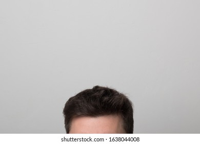 Brunette Man With Thick Hair. Men's Head. Studio Image Men's Hairstyle. 