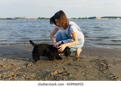 brunette travels on the beach true friend - Powered by Shutterstock