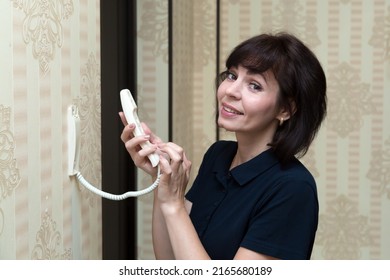 Brunette Wife 40-44 Years Old Opens The Door Intercom To Her Husband.