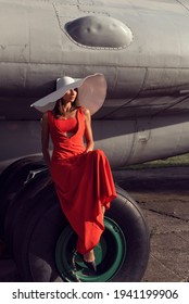 Brunette Woman At The Airfield