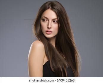 Brunette woman beauty hair long smooth hairstyle - Shutterstock ID 1409455268