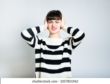 Brunette Woman Covering Her Ears With Both Hands :I Can't Hear!