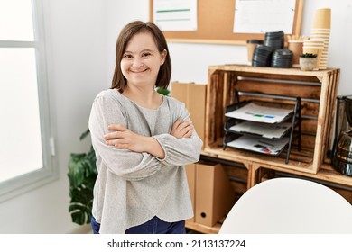 Brunette woman with down syndrome working standing with crossed arms at business office - Shutterstock ID 2113137224
