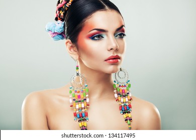 https://image.shutterstock.com/image-photo/brunette-woman-long-earrings-260nw-134117495.jpg