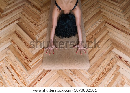 Similar – Image, Stock Photo Woman stretching on yoga mat in a yoga studio