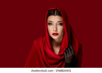 Brunette Woman With Red Lips And Veil Over Her Head