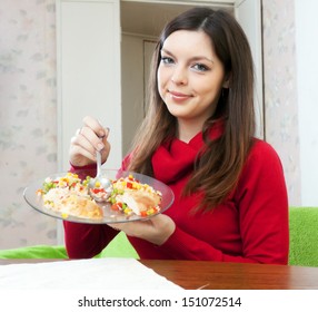 Brunette woman shared lunch for two parts to lose weight - Shutterstock ID 151072514