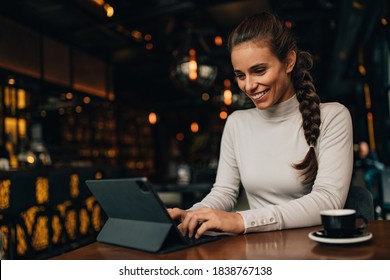 Brunette woman, typing one important document online. - Shutterstock ID 1838767138