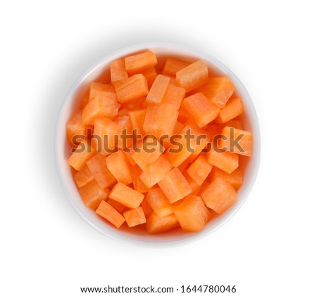 Brunoise carrots in white bowl isolated on white background, top view.