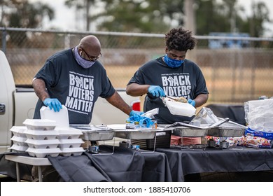 Brunswick, Georgia USA - December 31, 2020: Scenes From The Collard Green Caucus Food Giveaway, Sponsored By Black Voters Matter And A Better Glynn, Held At Ballard Park.