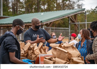 Brunswick, Georgia USA - December 31, 2020: Scenes from the Collard Green Caucus food giveaway, sponsored by Black Voters Matter and A Better Glynn, held at Ballard Park.