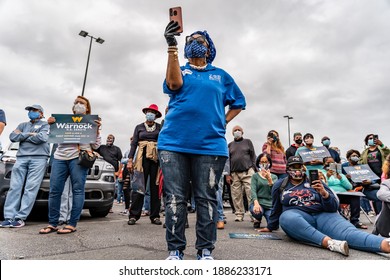 Brunswick, Georgia USA - January 2, 2021: Scenes From The Drive-in Rally For Georgia Senate Candidate Rev. Raphael Warnock (Democrat).