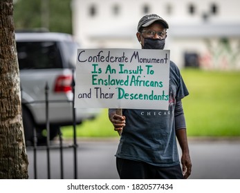 BRUNSWICK, GEORGIA / USA - September 23, 2020: Scenes from a protest and march about the public Confederate monument in Hanover Square, prior to a city meeting about the monument's future.