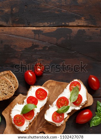 Image, Stock Photo Bruschetta with cream cheese, cherry tomatoes and basil