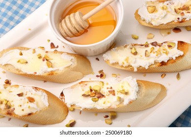 Bruschetta With Goat Cheese, Honey And Pistachios