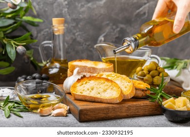 Bruschetta with olive oil, olives, pesto, garlic and parmesan. ciabatta bread with olive oil and spices. Delicacy. Delicious and healthy food. Vegan. Place to copy. copy space. - Powered by Shutterstock