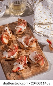 Bruschetta With Prosciutto And Pear With Blue Cheese Spread