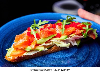 Bruschetta With Salmon, Avocado And Flying Fish Caviar