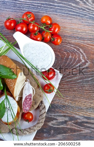 Similar – Image, Stock Photo Bruschetta with cream cheese, cherry tomatoes and basil