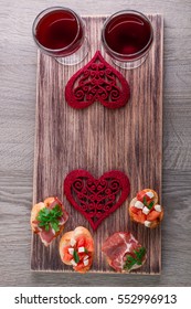 Bruschetta Set For Wine  On Rustic Wooden Board. Valentine Day. Romantic Dinner. Love. Copy Space. Top View.