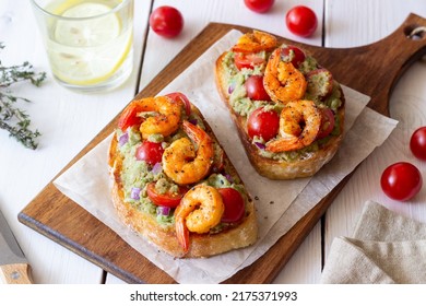 Bruschetta With Shrimp, Guacamole And Tomatoes. Healthy Eating. Breakfast