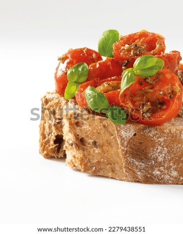bruschetta with sundried tomato and basil on white background Stock photo © 