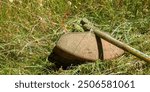 Brush cutter in a meadow mowing technology