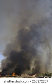 Brush Fire In Desert Emitting Large Black Plumes Of Smoke, East Of Needles In Arizona