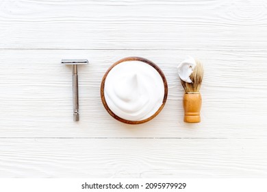 Brush Foam Shaver And Shaving Foam In Wooden Bowl, Top View