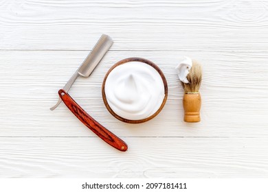 Brush Foam Shaver And Shaving Foam In Wooden Bowl, Top View