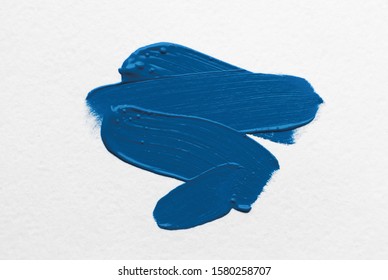 brush and paint texture on paper blue color. color the year 2020 pantone classic blue