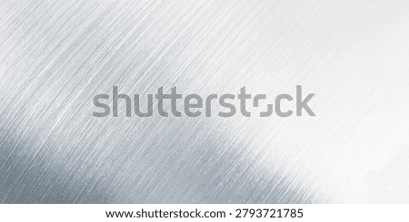 Brushed metallic surface, exhibiting a gradient from silver to white. The texture displays diagonal lines and a polished finish, creating an