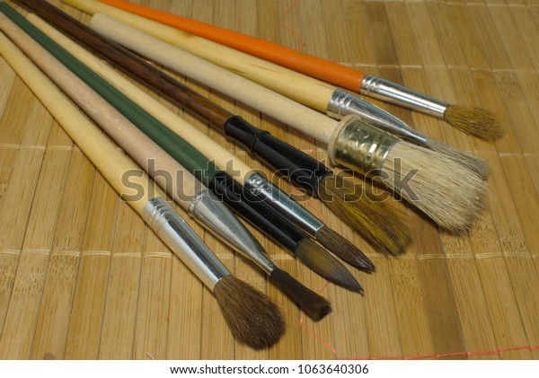 Brushes Artist On Bamboo Mat Stock Photo Edit Now 1063640306