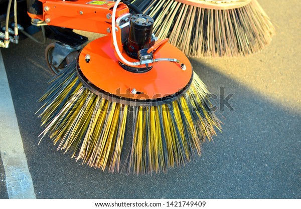 Brushes for
cleaning the streets are fixed on the car. Special machinery.
Machine with tassels. Car for cleaning in the city. Automatic road
cleaning brushes. Washing sidewalks. -
Image