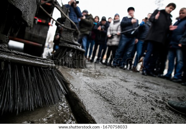 Brushes for
cleaning the streets are fixed on the car. Special machinery.
Machine with tassels. Car for cleaning in the city. Automatic road
cleaning brushes. Washing sidewalks.
