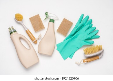 Brushes, sponges, rubber gloves and natural cleaning products on white background.  Eco-friendly cleaning products - Powered by Shutterstock