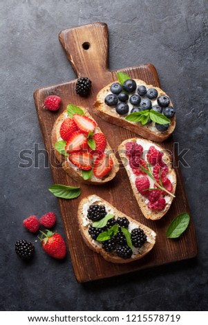 Similar – Image, Stock Photo Fresh bread with sweet fruits