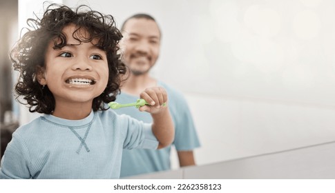 Brushing teeth, kid and boy with dental hygiene with father as child development in the bathroom for health and care. Young, mockup and toddler cleaning his oral or mouth in the mirror with dad - Powered by Shutterstock